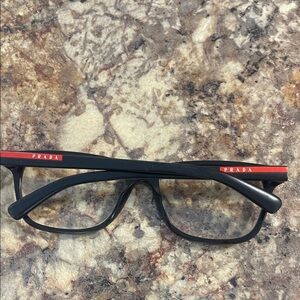 Prada Black Frame Eyeglasses with Red Detail